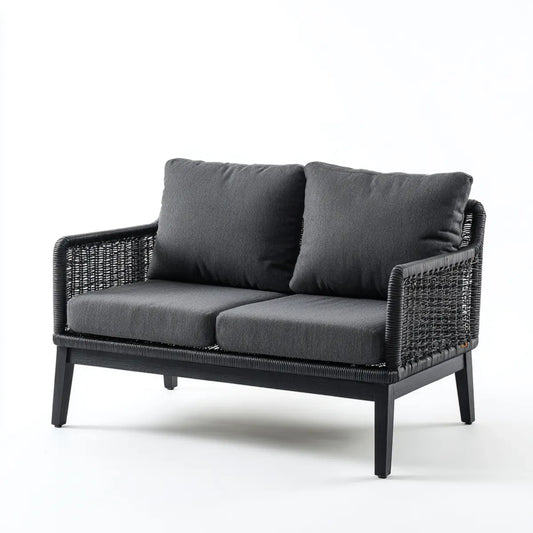 Sofa 2 fotele czarne 130 x 75 x 78 cm w rattanie PE z prostokątnymi poduszkami poliestrowymi